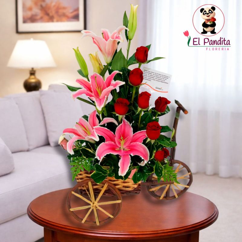 Canasta floral en carreta con lilium rosados y rosas rojas en Moquegua – Florería El Pandita